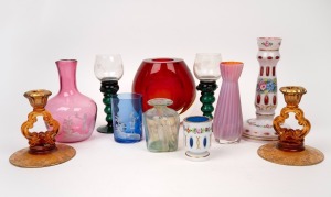 French glass candlesticks, green glass goblets, overlay glass lamp base and vase, reproduction Mary Gregory carafe and beaker plus two art glass vases, (11 items), the largest 22cm high.