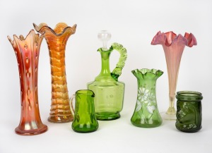 Antique and vintage glass vases, jugs and decanter, in carnival, green and ruby glass, 19th and 20th century, (7 items), the largest 29cm high.