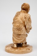 A Japanese carved ivory okimono figural group of a man and child, Meiji Period, 19th/20th century, with red seal mark to base, 10cm high. - 4