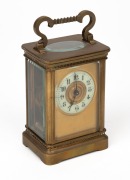 An antique French carriage clock with time only movement, Arabic numeral chaptering and engine turned dial mask, 19th century, 15cm high overall.