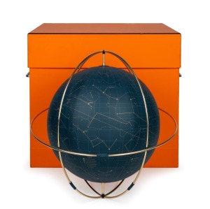 HERMES "APOLLO 24 Celestial Globe" in Bleu de Prusse (Prussian blue) leather and gold plated stainless steel, crafted in Germany, in original box of issue, Note: retail price a staggering $47,000. 40cm high overall.