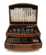 Silver plated cutlery set in canteen, bearing silver presentation plaque to the lid, mid 20th century, ​​​​​​​the canteen 45cm wide.