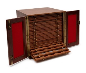 A vintage two door coin collector's cabinet revealing a bank of twenty-eight coin slide storage drawers, 20th century, 31cm high, 30cm wide, 30cm deep.