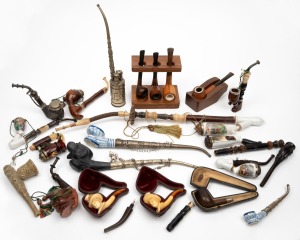 Collection of assorted antique and vintage pipes, including carved Meerschaum in original leather boxes, Austrian, German, English and Chinese examples, (qty).
