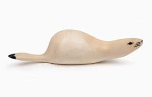 A Norwegian Sami marine ivory carving of an otto, 20th century, 13.5cm long.