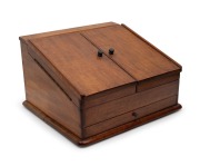 An Australian blackwood desk tidy with slope front, 20th century, ​​​​​​​26cm high, 43cm wide, 40cm deep.