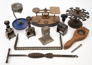 Desk calendar, antique scales, weights, office stamps, stand, unusual match holder, antique lemon squeezer, etc, 19th/20th century, (qty).