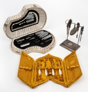 Three assorted manicure sets, mother of pearl, crystal and silver plate, 19th/20th century, ​​​​​​​the largest box 27cm wide.