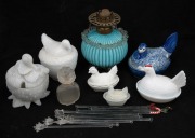 Antique blue glass oil lamp, Bimini glass swizzle sticks, pressed glass and porcelain chicken bowls and a French glass perfume bottle, 19th and 20th century, (16 items), the oil lamp 18cm high.