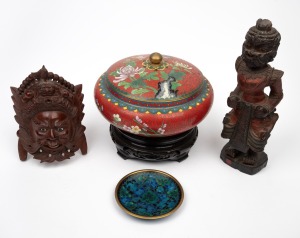 Vintage Chinese cloisonne lidded bowl on carved timber stand; together with a cloisonne dish, a vintage Chinese carved face mask ornament and a Southeast Asian carved wood polychrome statue, 20th century, (4 items), the statue 26cm high.