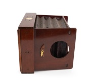 J.F. SHEW & CO.: "Eclipse" view camera, unusual gate-struts design, late-19th century, plate dimensions 16.5 x 12cm, uninscribed brass lens with ingenious aperture mechanism. - 2