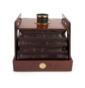 J.F. SHEW & CO.: "Eclipse" view camera, unusual gate-struts design, late-19th century, plate dimensions 16.5 x 12cm, uninscribed brass lens with ingenious aperture mechanism. - 4