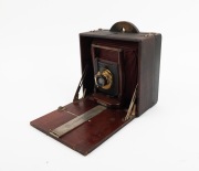 ROCHESTER OPTICAL CO.: "Pony Premo No. 3" folding camera, c. 1898, plate dimensions approx. 18 x 14cm, vivid red bellows, Wollensak pneumatic shutter. - 5