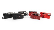 KODAK: Group of 1980s-90s plastic point-and-shoot cameras, comprising Prostar 333, S900 Tele, S100EF, S10 (red), S10 (black), and S50. (6 items)