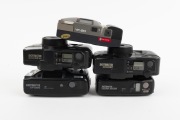RICOH: Group of 1990s plastic point-and-shoot cameras, comprising Shotmaster Ultra Zoom, Shotmaster Zoom IIIP Panorama, Shotmaster Zoom IIIP Date Panorama, Shotmaster AF Date, and YF-20. (5 items) - 3