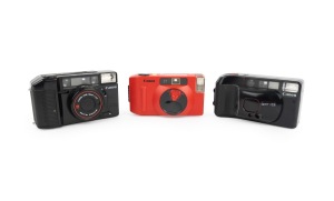 CANON: Group of 1980s plastic point-and-shoot cameras, comprising Sure Shot Supreme, Sure Shot, and Snappy S. (3 items)