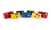 PLASTIC POINT-AND-SHOOT CAMERAS: Diverse 1980s-90s group comprising Hanimex Date, Hanimex 35D, Kafon KA-501, Longbeach PC-606, "Showbag Carousel", Yashica Electro 35 AF-Mini, and Yashica Partner AF (red). (7 items)