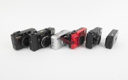 KONICA: Group of 1990s plastic point-and-shoot cameras, comprising A4 Close Up/Auto Focus, C35 AF, C35 EF3, Pop (black x 2), and Z-Up 60e AF. (6 items) - 2