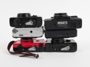 KONICA: Group of 1990s plastic point-and-shoot cameras, comprising A4 Close Up/Auto Focus, C35 AF, C35 EF3, Pop (black x 2), and Z-Up 60e AF. (6 items) - 3