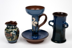 TORQUARY WARE English pottery candlestick with bird decoration; together with two vases, early 20th century, (3 items), factory marks to base, the largest 14cm high.