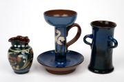 TORQUARY WARE English pottery candlestick with bird decoration; together with two vases, early 20th century, (3 items), factory marks to base, ​​​​​​​the largest 14cm high.