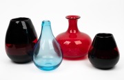 Four assorted coloured glass vases, ​​​​​​​the largest 21cm high.