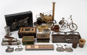 Assorted ornaments, money boxes, pewter decanter labels, Rocket toy, model tricycle, cigarette lighters, etc, (qty).