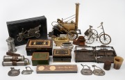 Assorted ornaments, money boxes, pewter decanter labels, Rocket toy, model tricycle, cigarette lighters, etc, (qty).