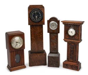 Four assorted vintage clocks in homemade timber cases, 19th/20th century, the largest 46cm high.