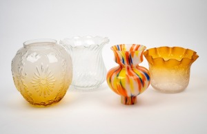 Four assorted antique and vintage glass oil lamp shades, 19th/20th century, the largest 20cm high, gallery diameter 10.5cm.