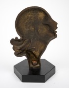 An Art Deco profile portrait female head ornament mounted on black slate base, circa 1930s, 19cm high. - 2