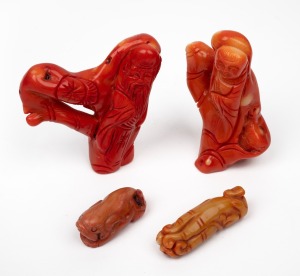 Four Chinese carved coral amulets, 19th/20th century, the largest 9cm high.