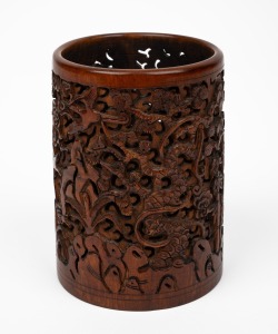 A vintage Chinese carved bamboo brush pot, 20th century, 12cm high.