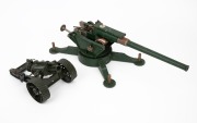 Two English made model artillery pieces, most likely Dinky/Meccano, the larger 34cm long.