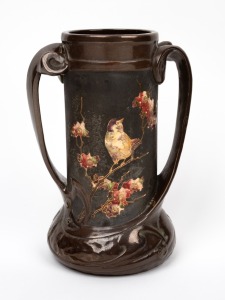 BRETBY English Arts & Crafts pottery vase with bird and blossom decoration, 19th/20th century, factory mark to base, 26cm high.