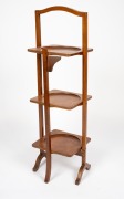 An antique English mahogany Sheraton Revival folding three tier cake stand, early 20th century, 95cm high, 31cm wide, 28cm deep. - 2
