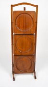An antique English mahogany Sheraton Revival folding three tier cake stand, early 20th century, 95cm high, 31cm wide, 28cm deep. - 3