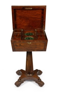 An antique English mahogany teapoy with octagonal tapering column, centurion skirt collar, platform base and scroll feet. Interior handsomely fitted with four lidded caddies, two mixing compartments and fittings for spoons, circa 1840, 81cm high, 43cm wid