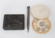 Antique turned ivory circular box housing diamond gemstone gram weights; together with an antique silver pencil and an antique Japanese miniature ink stone box, 19th/20th century, (3 items), the ivory case 6cm diameter.