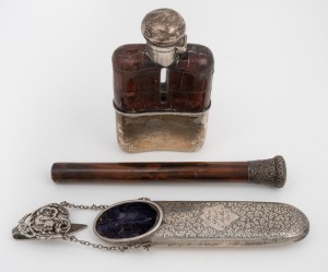Antique sterling silver chatelaine style spectacle case; together with a sterling silver hip flask and an antique parasol handle with a sterling silver cap, 19th and 20th century, (3 items), the hipflask 13cm high.