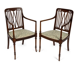 A pair of antique Australian blackwood armchairs with blue floral velvet upholstery, early 20th century, 90cm high, 50cm across the arms.