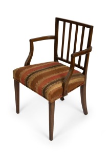 A Georgian mahogany Hepplewhite design armchair with elbow supports and reeded back rests, circa 1770, 86cm high, 55cm across the arms.