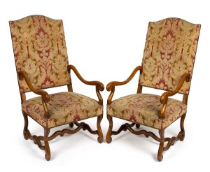 A pair of reproduction French carved beech armchairs with acanthus pattern upholstery, 20th century in the 18th century style, 120cm high, 60cm across the arms.