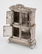 An antique Dutch silver dolls house miniature cabinet, 19th/20th century, ​​​​​​​9cm high, 120 grams. - 2