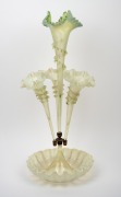 An antique English vaseline glass four trumpet epergne, 19th century, 59cm high. - 2