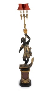 An antique Italian Blackamoor figure torchiere, 19th century. Note: 20th century conversion to electricity (most likely carried out in the 1950s). 164cm high overall.