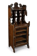 An antique English rosewood sheet music cabinet with bookstand top, 19th century, 122cm high, 45cm wide, 35cm deep.