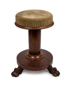 An antique English mahogany revolving piano stool with carved claw feet, circa 1835, 48cm high, 32cm diameter.