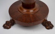 An antique English mahogany revolving piano stool with carved claw feet, circa 1835, 48cm high, 32cm diameter. - 2