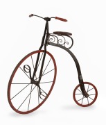 A reproduction penny farthing child size bicycle, late 20th century, 90cm high, the penny wheel 50cm diameter.